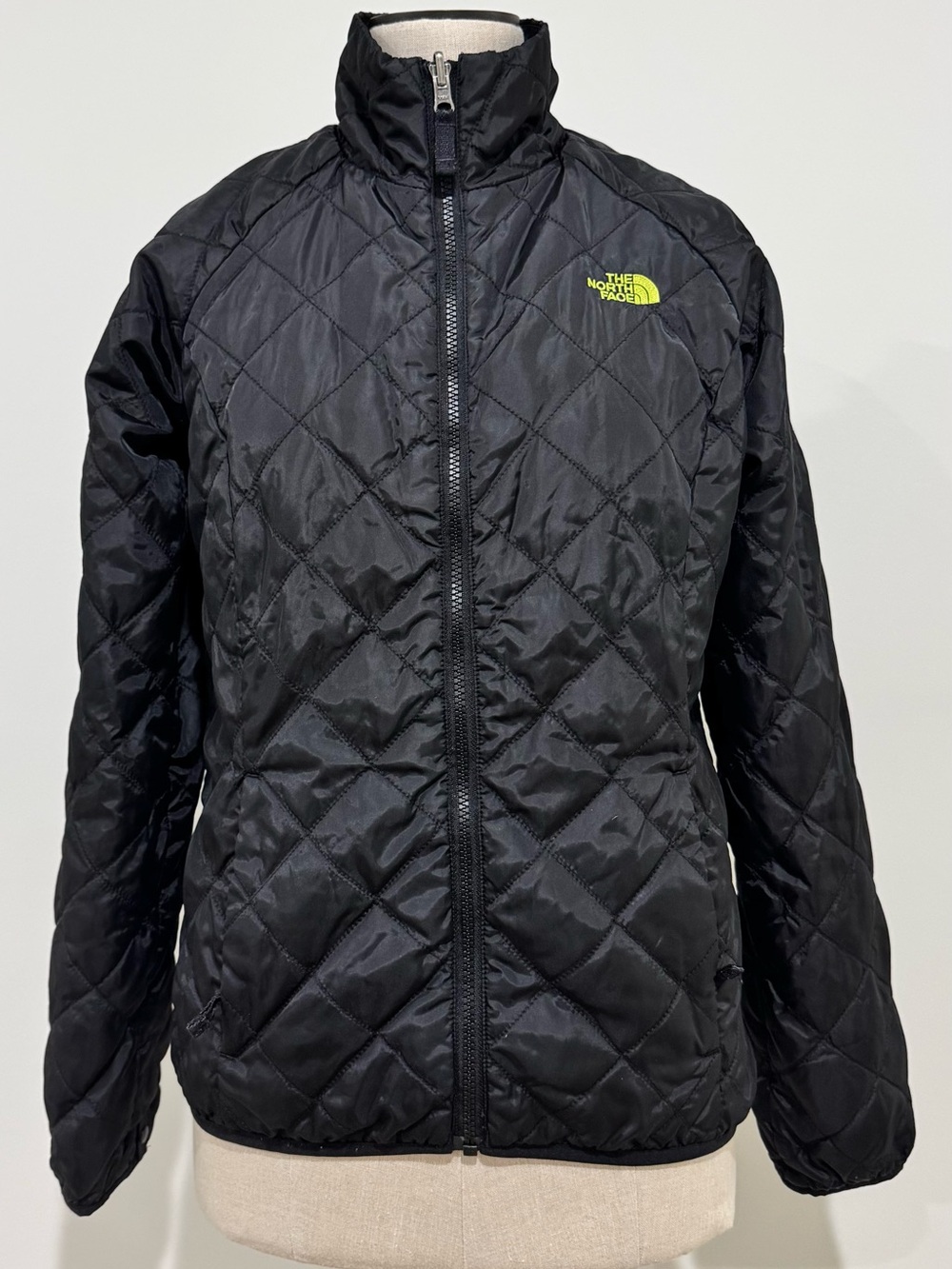 The North Face Black Quilted Jacket with Neon Green Logo